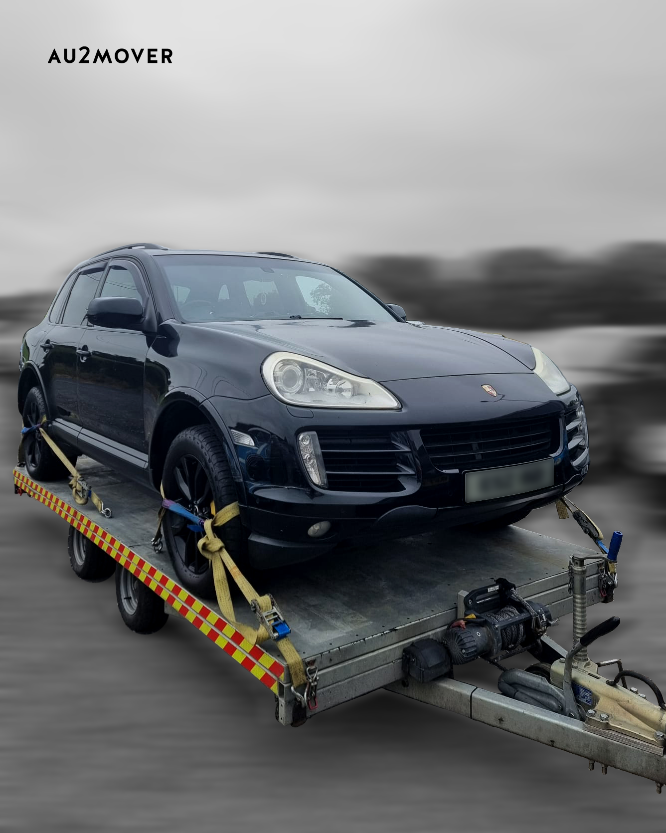 Black Porsche Cayenne transported by Au2mover